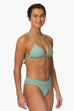 Alanna Bikini Bottom - Newport -Outlet Aqua Surf Wears Store Surf Bottoms Alanna Solid Newport SideFront MiaClark 011623