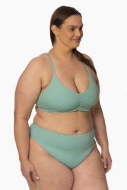 Leandra Bikini Bottom - Newport -Outlet Aqua Surf Wears Store Surf Bottoms Leandra Solid Newport SideFront AdrianaK 011923