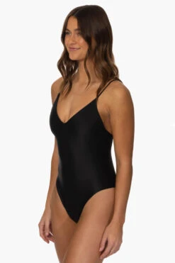 Juana Surf One Piece - Black -Outlet Aqua Surf Wears Store Surf Onesies Juana Solid Black SideFront MiaClark 011623