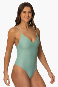 Juana Surf One Piece - Newport -Outlet Aqua Surf Wears Store Surf Onesies Juana Solid Newport SideFront MiaClark 011623