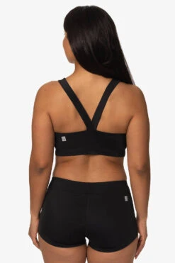 Piha Surf Short - Black -Outlet Aqua Surf Wears Store Swim Bottoms Piha Solid Black Back TiaSurf KianiSouza 020923