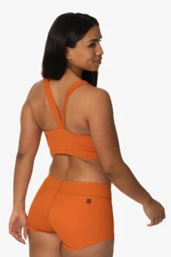 Piha Surf Short - Ginger -Outlet Aqua Surf Wears Store Swim Bottoms Piha Solid Ginger Back Side TiaSurf KianiSouza 020923