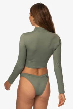 Tofino Long Sleeved Crop 1/4 Zip-up Rashie - Eucalyptus -Outlet Aqua Surf Wears Store Swim Tops Tofino Solid Eucalyptus Back Side TiaSurf MiskaSykora 021023